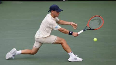 Argentina's Diego Schwartzman returns the ball to France's Gael Monfils during their men's singles first round tennis match on day one of the US Open tennis tournament at the USTA Billie Jean King National Tennis Center in New York City, on August 26, 2024.