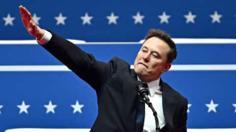 Tesla and SpaceX CEO Elon Musk gestures as he speaks during the inaugural parade inside Capitol One Arena, in Washington, DC, on January 20, 2025. (Photo by ANGELA WEISS / AFP) (Photo by ANGELA WEISS/AFP via Getty Images)