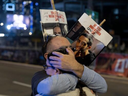 Protesters calling for the return of hostages held in the Gaza Strip react after a Gaza ceasefire and hostage release deal was reached on January 15, 2025 in Tel Aviv, Israel.