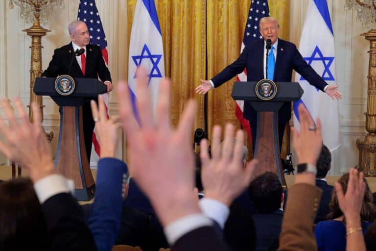 Reporters stand and shout in an attempt to get the attention of U.S. President Donald Trump as he and Israeli Prime Minister Benjamin Netanyahu hold a joint news conference in the East Room of the White House on February 04, 2025 in Washington, DC. Netanyahu is the first foreign leader to visit Trump since he returned to the White House last month.