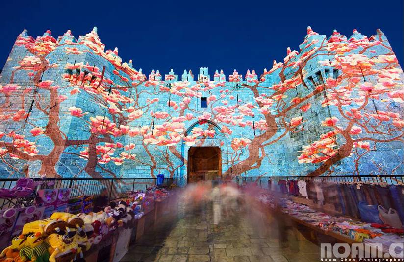 Lights are projected onto the walls of Jerusalem.