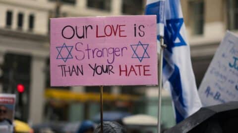 Sign supporting the Jewish community at a march against antisemitism (Photo by Levi Meir Clancy).